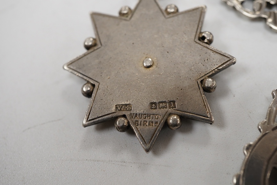 Five assorted early 20th century silver medals, including enamelled 'Luton District Football League, 1910/11', diameter 28mm.
